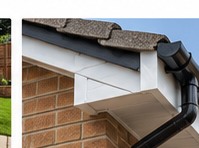 Close-up of roof fascia, soffit and guttering